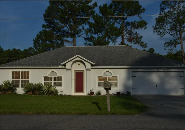 Photo 3 of Single family home for sale at 49 Buffalo Grv Dr, Palm Coast, FL 32137 | MLS# FC321455 | Listing updated on 2026-10-09