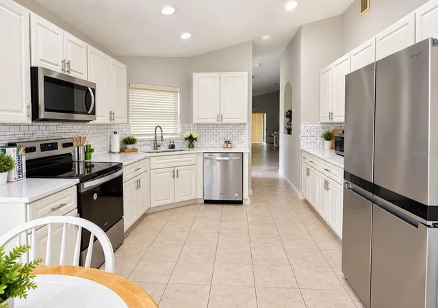 Photo 4 of Single family home for sale at 313 Grand Cnl Dr, Poinciana, FL 34759 | MLS# S5157591 | Listing updated on 2026-09-21