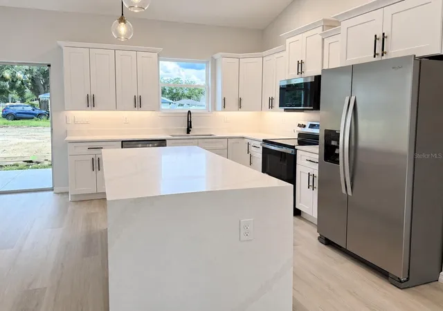 Photo 4 of Single family home for sale at 5500 Pecan Rd, Ocala, FL 34472 | MLS# OM732289 | Listing updated on 2026-09-18