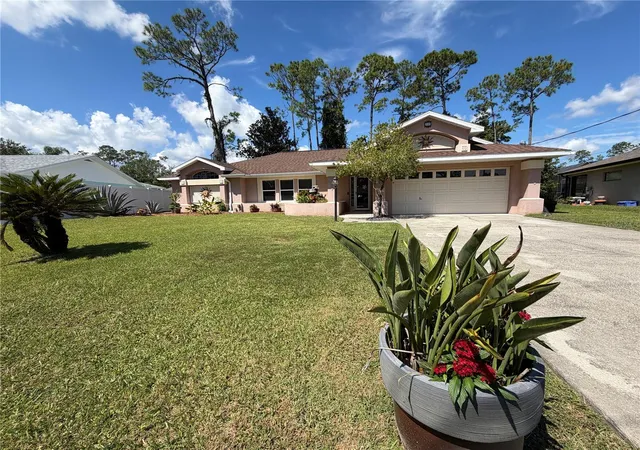 Photo 2 of Single family home for sale at 39 Pepper Ln, Palm Coast, FL 32164 | MLS# FC321459 | Listing updated on 2026-10-17