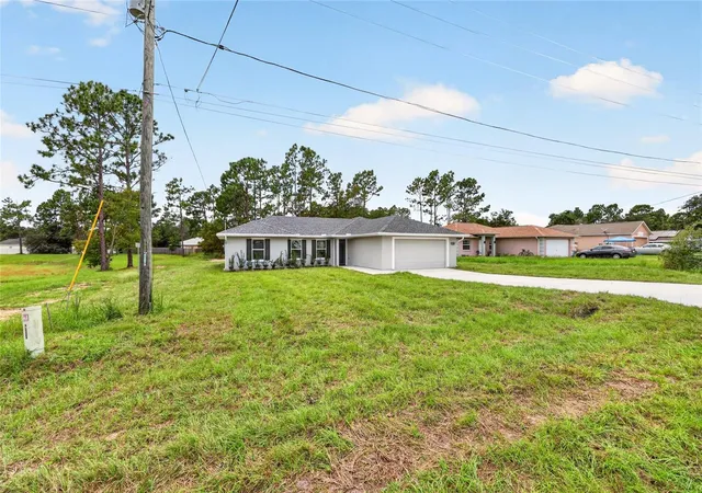 Photo 2 of Single family home for sale at 7166 Hemlock Rd, Ocala, FL 34472 | MLS# OM732305 | Listing updated on 2026-09-16