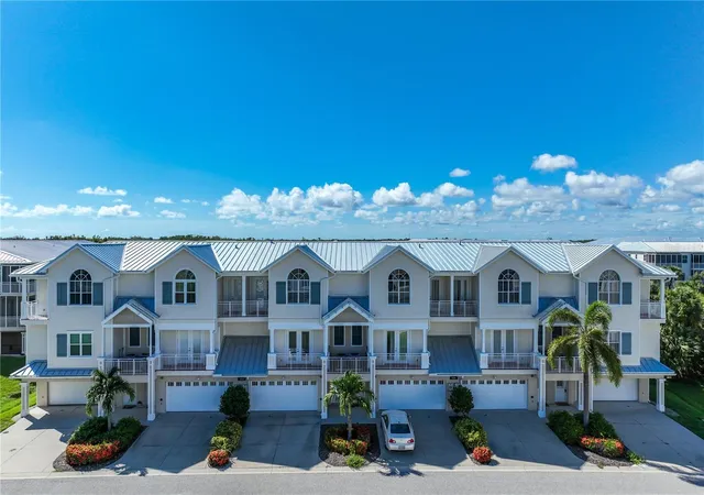 Photo 1 of Townhouse for sale at 10300 Coral Landings Ct #91, Placida, FL 33946 | MLS# N6145771 | Listing updated on 2026-10-05