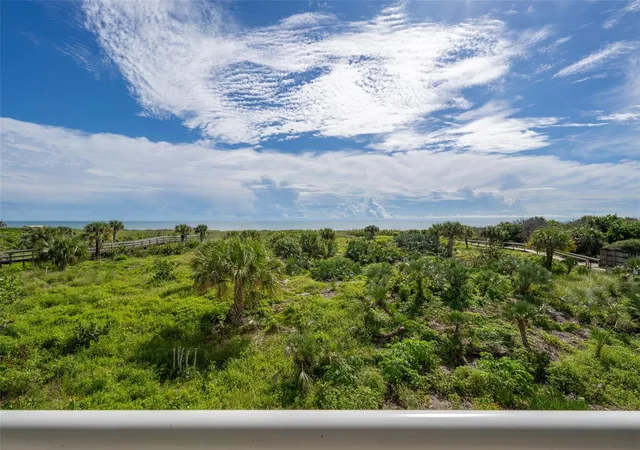 Photo 1 of Condo for sale at 3400 Ocean Beach Blvd #210, Cocoa Beach, FL 32931 | MLS# O6441933 | Listing updated on 2026-09-23