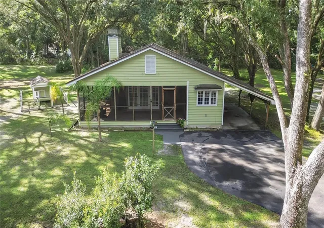 Photo 1 of Single family home for sale at 6075 Country Clb Rd, Wesley Chapel, FL 33544 | MLS# TB8548780 | Listing updated on 2026-09-19