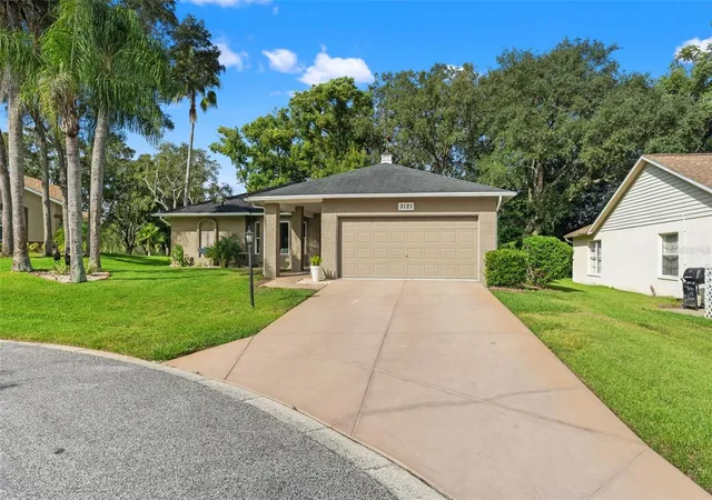 Photo 3 of Single family home for sale at 3121 Double Eagle Ct, Spring Hill, FL 34606 | MLS# W7889545 | Listing updated on 2026-09-16