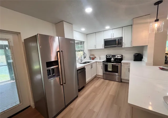Photo 3 of Single family home for sale at 7728 Whisper Pl, Orlando, FL 32810 | MLS# O6441969 | Listing updated on 2026-09-18
