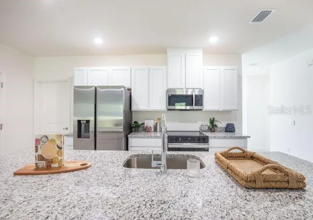 Photo 2 of Single family home for sale at 24 Ramrock Ln, Palm Coast, FL 32164 | MLS# O6441981 | Listing updated on 2026-09-16