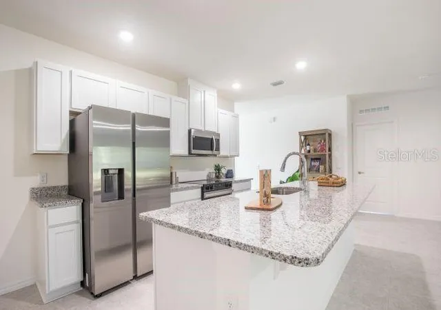 Photo 3 of Single family home for sale at 24 Ramrock Ln, Palm Coast, FL 32164 | MLS# O6441981 | Listing updated on 2026-09-16