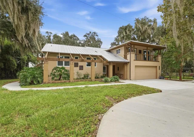 Photo 2 of Single family home for sale at 7827 NE 310th Avenue, Fort Mc Coy, FL 32134 | MLS# OM732318 | Listing updated on 2026-09-26