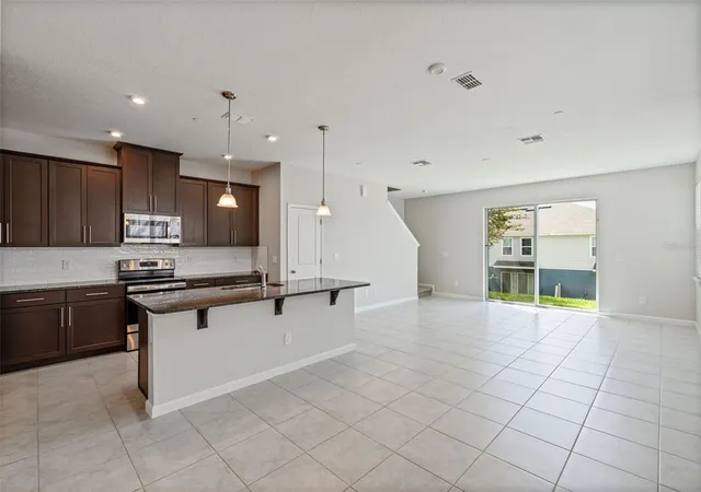 Photo 3 of Townhouse for sale at 1874 Holden Ridge Ln, Clermont, FL 34715 | MLS# G5117832 | Listing updated on 2026-09-16