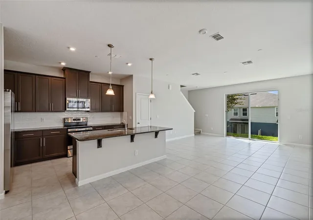 Photo 3 of Townhouse for sale at 1874 Holden Ridge Ln, Clermont, FL 34715 | MLS# G5117832 | Listing updated on 2026-09-16