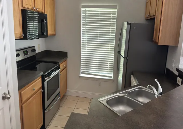 Photo 3 of Condo for sale at 9149 Lee Vista Blvd #405, Orlando, FL 32829 | MLS# S5157640 | Listing updated on 2026-10-07