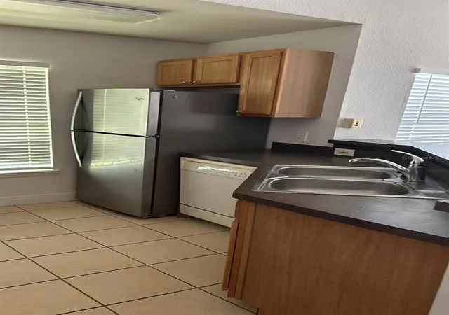 Listing Photo 5 - Condo for sale in building located at 9149 Lee Vis Blvd, Orlando, FL 32829 - Unit #405