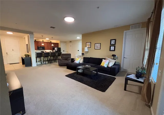 Listing Photo 1 - Condo for sale in building located at 5048 Shoreway Loop, Orlando, FL 32819 - Unit #101