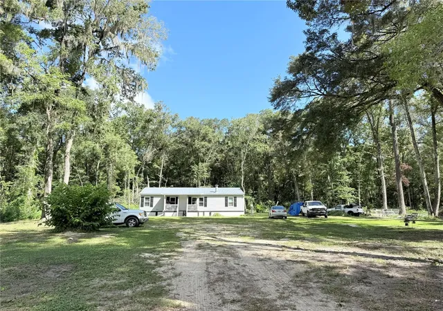 Photo 2 of Manufactured home for sale at 12051 Nw 7th Place, Ocala, FL 34482 | MLS# OM732329 | Listing updated on 2026-10-07