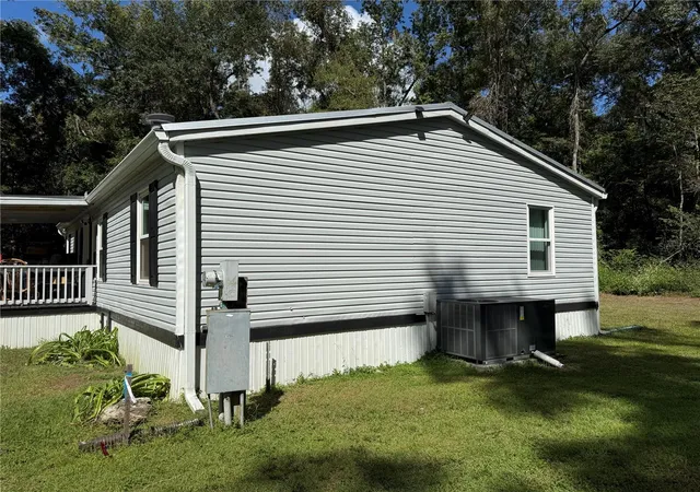 Photo 3 of Manufactured home for sale at 12051 Nw 7th Place, Ocala, FL 34482 | MLS# OM732329 | Listing updated on 2026-10-07