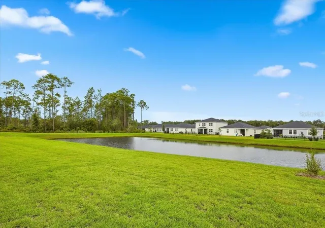 Photo 3 of Single family home for sale at 15 Wandering Crk Way, Palm Coast, FL 32164 | MLS# FC321483 | Listing updated on 2026-09-21