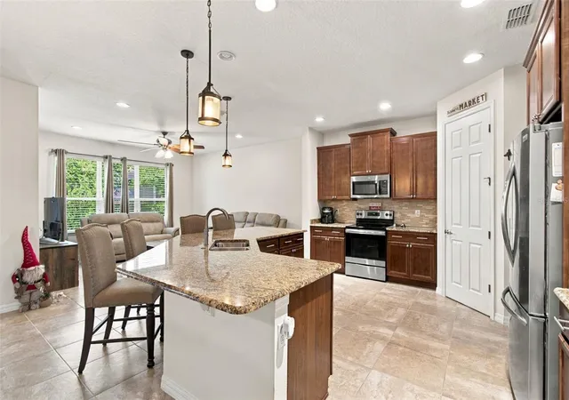 Photo 4 of Single family home for sale at 885 Pacific Ridge Rd, Kissimmee, FL 34759 | MLS# S5157651 | Listing updated on 2026-10-05