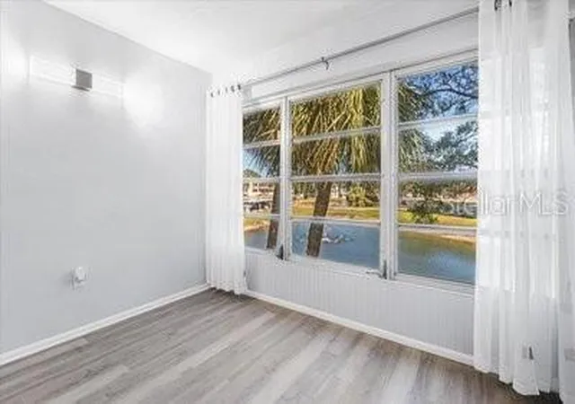Listing Photo 5 - Condo for sale in building located at 821 Patricia Ave, Dunedin, FL 34698 - Unit #202