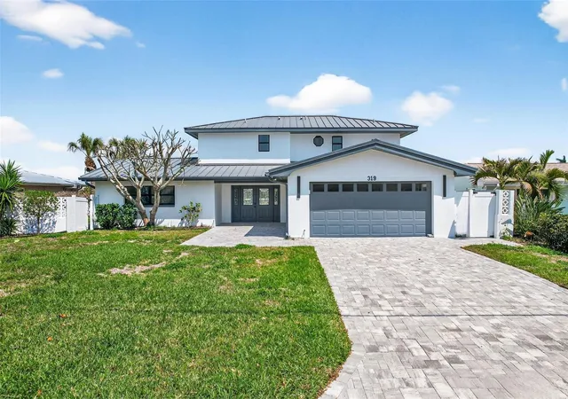 Photo 1 of Single family home for sale at 319 Midway Is, Clearwater Beach, FL 33767 | MLS# O6442148 | Listing updated on 2026-09-23