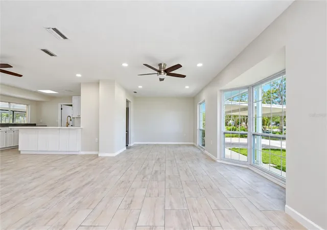 Photo 4 of Single family home for sale at 8013 W Elm St, Tampa, FL 33615 | MLS# TB8549056 | Listing updated on 2026-09-26
