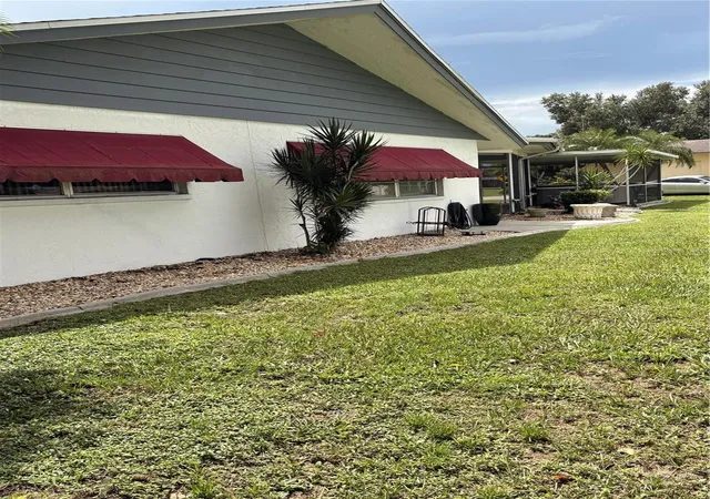 Photo 2 of Single family home for sale at 1936 Rolling Green Cir, Sarasota, FL 34240 | MLS# TB8549072 | Listing updated on 2026-09-17