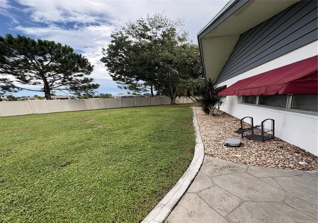 Photo 3 of Single family home for sale at 1936 Rolling Green Cir, Sarasota, FL 34240 | MLS# TB8549072 | Listing updated on 2026-09-17