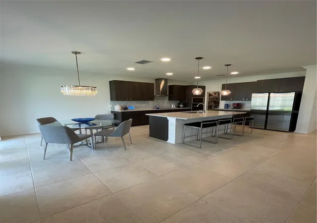 Photo 3 of Single family home for sale at 7491 Notched Pine Bnd, Wesley Chapel, FL 33545 | MLS# TB8549086 | Listing updated on 2026-09-19