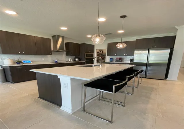 Photo 4 of Single family home for sale at 7491 Notched Pine Bnd, Wesley Chapel, FL 33545 | MLS# TB8549086 | Listing updated on 2026-09-19