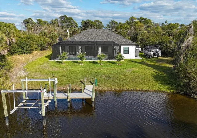Photo 1 of Single family home for sale at 1015 Hoffer St, Port Charlotte, FL 33953 | MLS# C7530802 | Listing updated on 2026-10-12