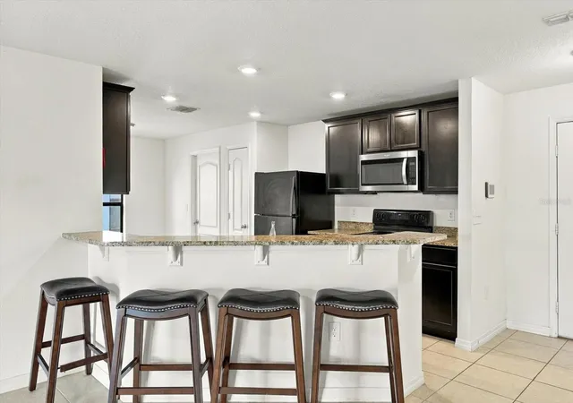 Photo 3 of Single family home for sale at 810 Chatham Walk Dr, Ruskin, FL 33570 | MLS# TB8549139 | Listing updated on 2026-10-08