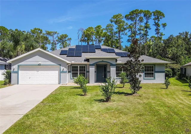 Photo 2 of Single family home for sale at 100 Boulder Rock Dr, Palm Coast, FL 32137 | MLS# FC321495 | Listing updated on 2026-09-17