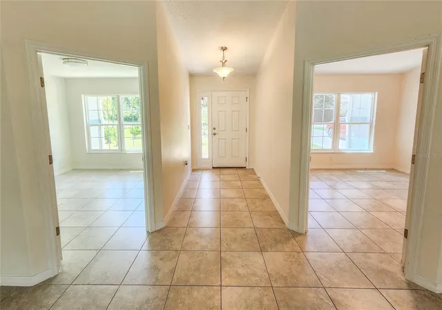 Photo 3 of Single family home for sale at 100 Boulder Rock Dr, Palm Coast, FL 32137 | MLS# FC321495 | Listing updated on 2026-09-17