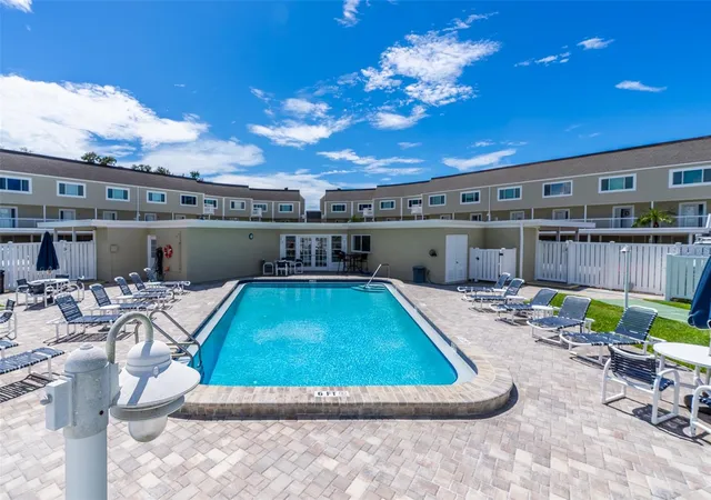 Photo 3 of Condo for sale at 433 S Paula Dr #21, Dunedin, FL 34698 | MLS# TB8549146 | Listing updated on 2026-09-21