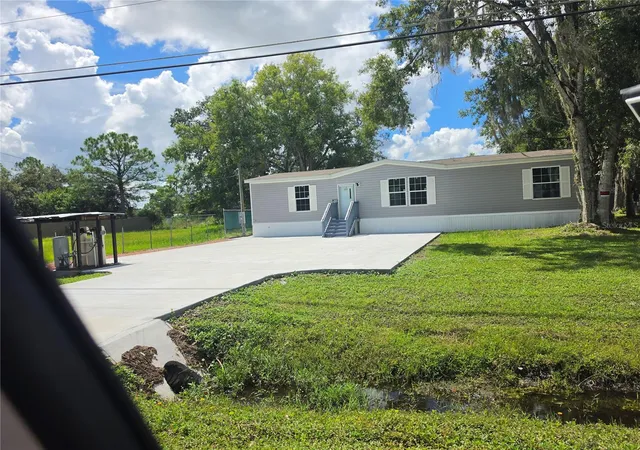 Photo 2 of Manufactured home for sale at 18630 Old Cheney Hwy, Orlando, FL 32820 | MLS# S5157707 | Listing updated on 2026-10-08
