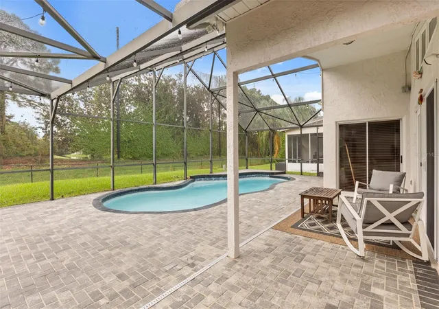 Photo 3 of Single family home for sale at 11612 Peach Grv Ln, Orlando, FL 32821 | MLS# O6442323 | Listing updated on 2026-10-06