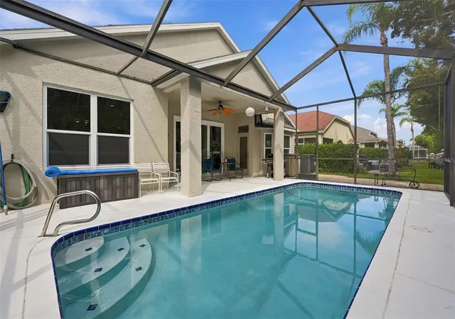 Photo 2 of Single family home for sale at 19401 Melody Fair Pl, Lutz, FL 33558 | MLS# W7889570 | Listing updated on 2026-10-03