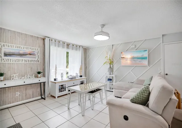 Photo 3 of Townhouse for sale at 3913 Magnolia Pointe Ln, Orlando, FL 32810 | MLS# O6442359 | Listing updated on 2026-09-20