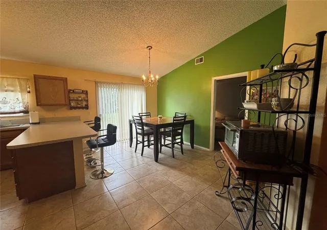 Photo 3 of Single family home for sale at 306 Oak Ln Pass, Ocala, FL 34472 | MLS# OM732373 | Listing updated on 2026-09-17