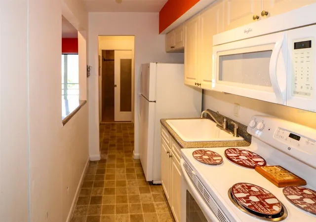 Listing Photo 5 - Condo for sale in building located at 22302 Vick St, CHARLOTTE HARBOR, FL 33980 - Unit #220