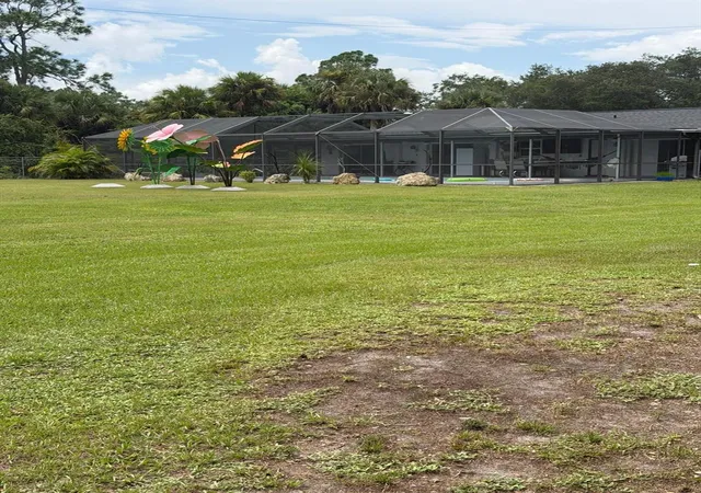 Photo 1 of Single family home for sale at 704 Cleveland Ave, Lehigh Acres, FL 33972 | MLS# O6442461 | Listing updated on 2026-09-19