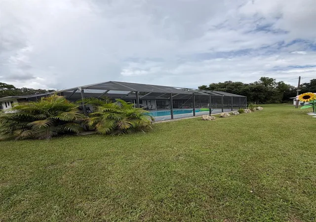 Photo 3 of Single family home for sale at 704 Cleveland Ave, Lehigh Acres, FL 33972 | MLS# O6442461 | Listing updated on 2026-09-19