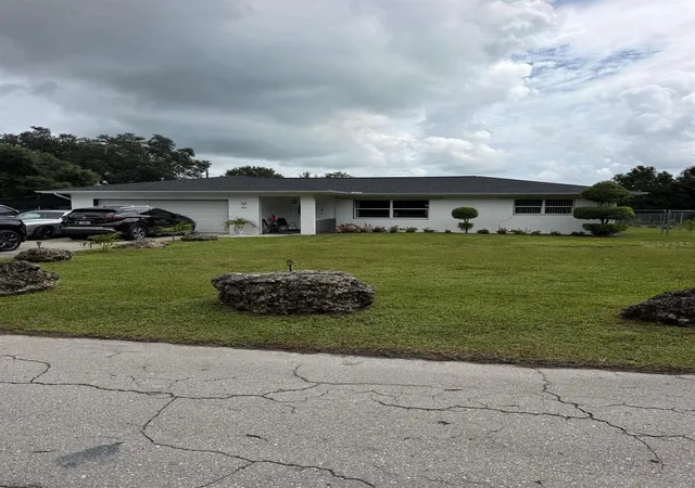 Photo 4 of Single family home for sale at 704 Cleveland Ave, Lehigh Acres, FL 33972 | MLS# O6442461 | Listing updated on 2026-09-19