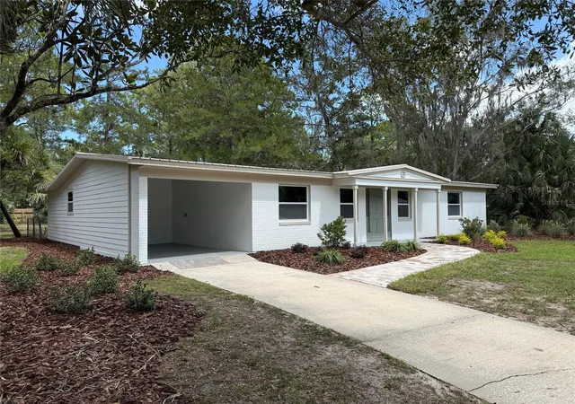 Photo 2 of Single family home for sale at 1404 Ne 31st Avenue, Gainesville, FL 32609 | MLS# GC543568 | Listing updated on 2026-10-01