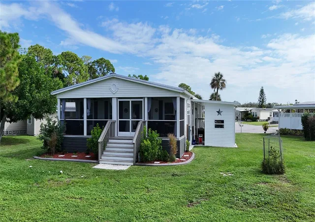 Photo 2 of Manufactured home for sale at 6393 Kilepa Ct, North Port, FL 34287 | MLS# C7530841 | Listing updated on 2026-10-07
