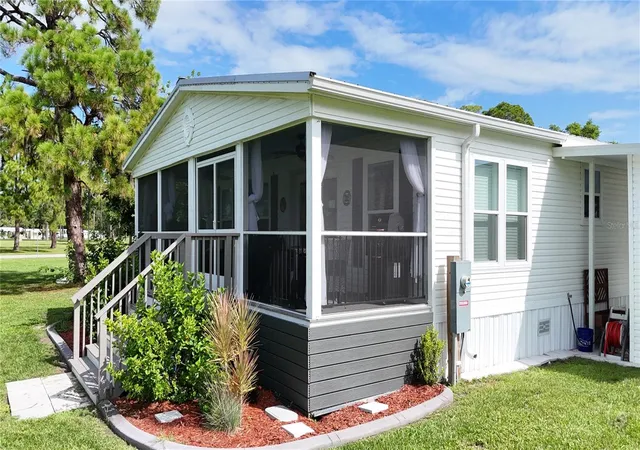 Photo 3 of Manufactured home for sale at 6393 Kilepa Ct, North Port, FL 34287 | MLS# C7530841 | Listing updated on 2026-10-07