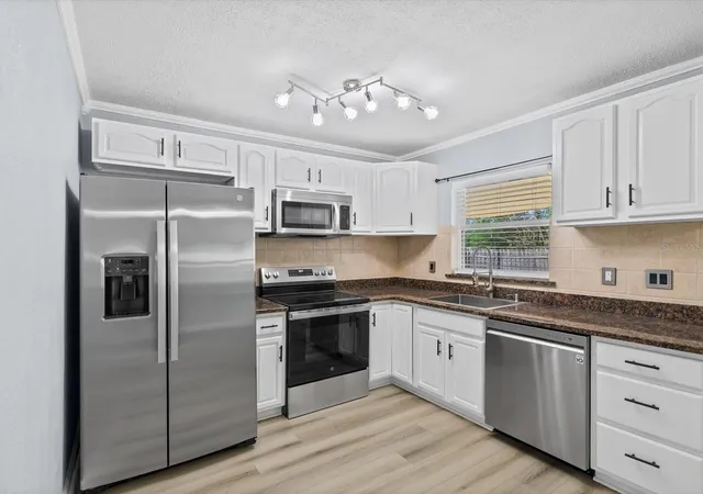 Photo 3 of Single family home for sale at 1168 Keene Rd, Dunedin, FL 34698 | MLS# TB8549320 | Listing updated on 2026-10-13