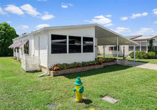 Photo 1 of Manufactured home for sale at 35106 Mcculloughs Leap, Zephyrhills, FL 33541 | MLS# W7889589 | Listing updated on 2026-09-17