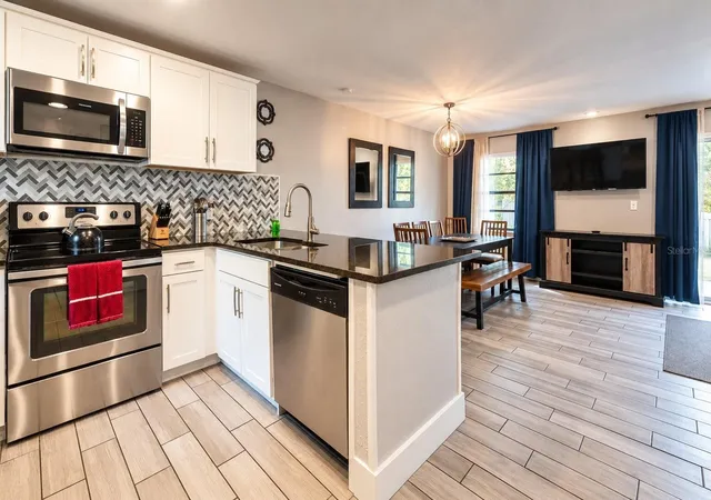 Photo 2 of Townhouse for sale at 1122 Spaceport Ct, Kissimmee, FL 34746 | MLS# O6442531 | Listing updated on 2026-10-01