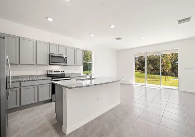 Photo 4 of Townhouse for sale at 1393 Colt Crk Pl, Wesley Chapel, FL 33543 | MLS# TB8549396 | Listing updated on 2026-10-08